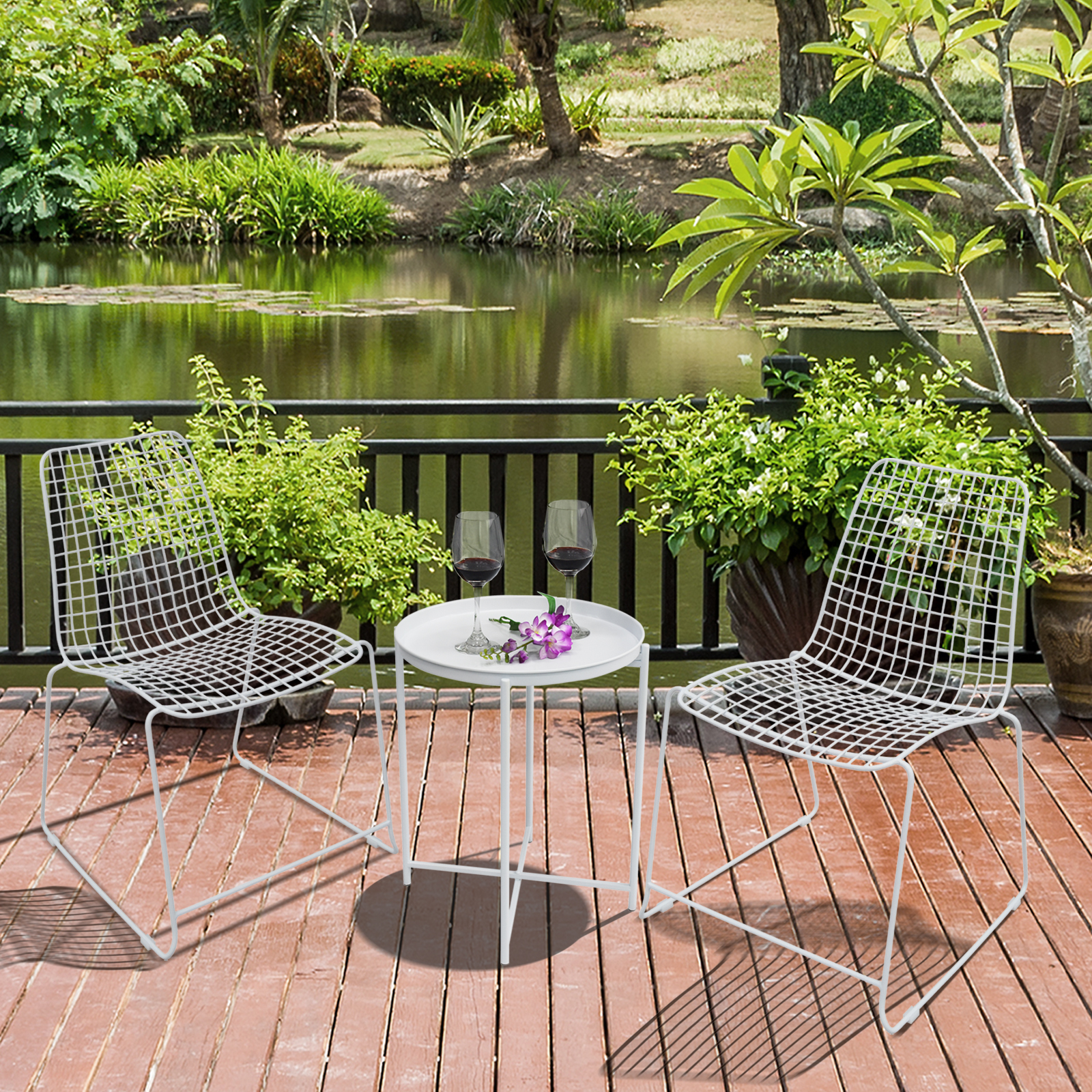 A patio metal table and chairs White